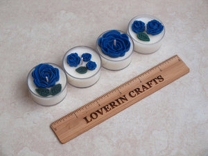 "Blue Roses" Tealight Set - Blue roses and deep green leaves on white tealight candles.