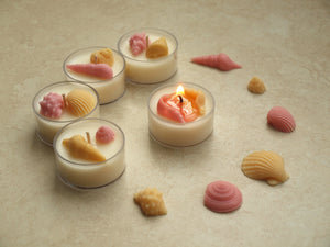 "By the Seashore" Tealight Set - Miscellaneous pastel wax seashells on white tealight candles.