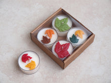 Load image into Gallery viewer, &quot;Changing Leaves&quot; Tealight Set - Colorful wax leaves on four white tealight candles.