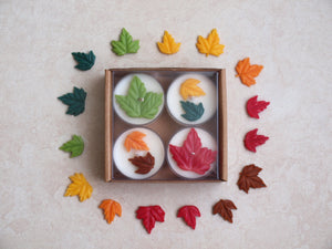 "Changing Leaves" Tealight Set - Colorful wax leaves on four white tealight candles.