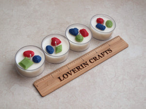 "Jewel Tone" Tealight Set - Colorful wax jewels on four white tealight candles.