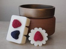 Load image into Gallery viewer, Berries and Cream scented soy wax melts. White wax adorned with wax raspberries and blackberries. Melts available in tarts and clamshell bricks.