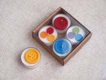 Load image into Gallery viewer, &quot;Rainbow Buttons&quot; Tealight Set - Colorful wax buttons on four white tealight candles.&quot;Rainbow Buttons&quot; Tealight Set - Colorful wax buttons on four white tealight candles.