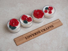 Load image into Gallery viewer, Red Roses Tealight Set - Red roses and deep green leaves on four white tealight candles.