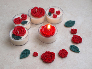 Red Roses Tealight Set - Red roses and deep green leaves on white tealight candles.